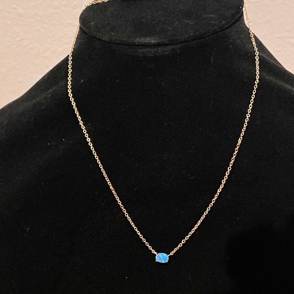 Elegant Gold Necklace with Blue Opal
